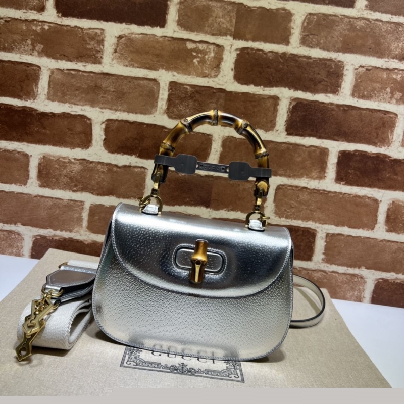 G*u*i top handle bags